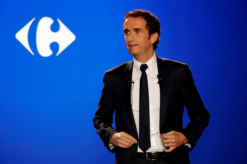 © Reuters. FILE PHOTO: Alexandre Bompard, CEO of French retailer Carrefour, poses before a news conference in La Defense near Paris