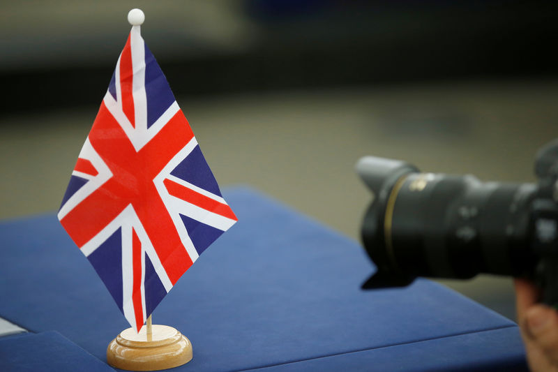 © Reuters. A British Union Jack flag is seen on the desk of a MEP ahead of a debate on the future of Europe at the European Parliament in Strasbourg