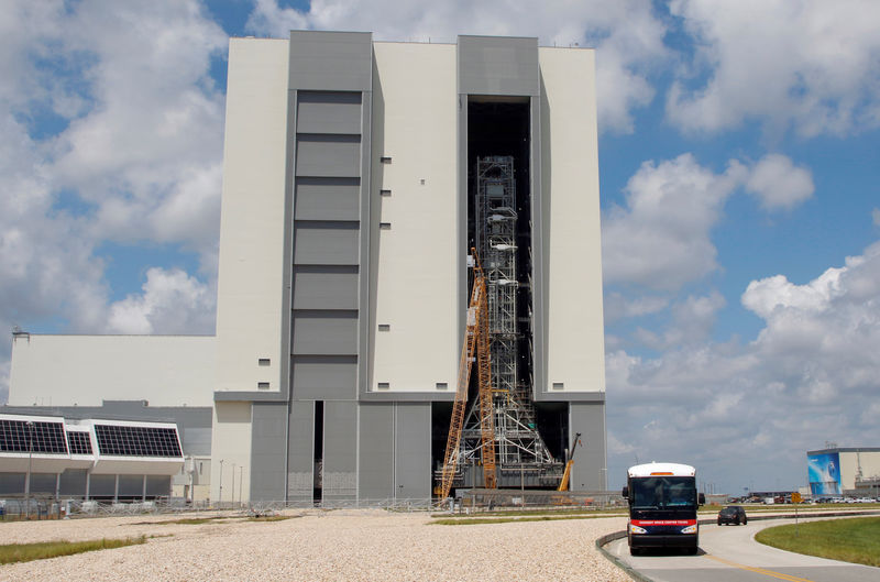 © Reuters. FILE PHOTO: A mobile launcher platform for the Space Launch System rocket isseen inside the Vehicle Assembly Building during a NASA "Apollo - Then and Now" event at the Kennedy Space Center in Cape Canaveral