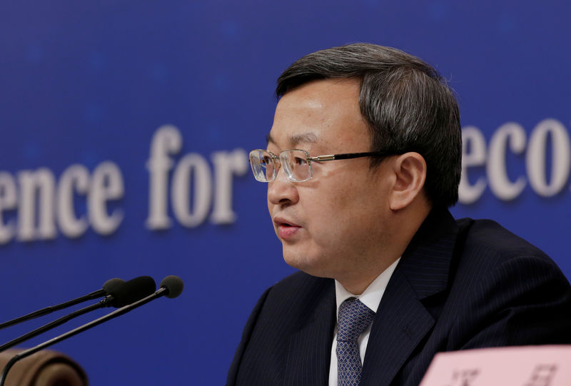 © Reuters. FILE PHOTO: Chinese Vice Commerce Minister and Deputy China International Trade Representative Wang Shouwen attends a news conference during ongoing session of the NPC in Beijing