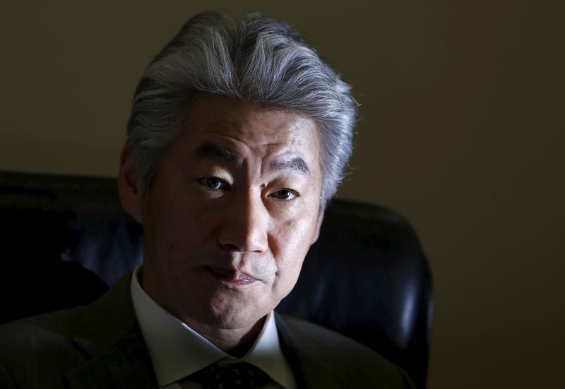 © Reuters. FILE PHOTO:  Nomura Holdings' Chief Executive Officer Nagai attends an interview with Reuters in Tokyo