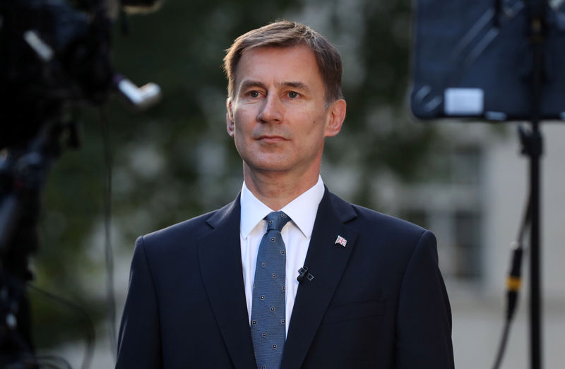 © Reuters. Conservative Party leadership candidate Jeremy Hunt attends an interview outside his home in London