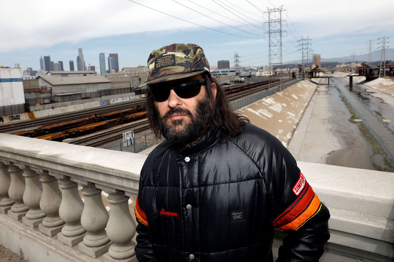 © Reuters. FILE PHOTO: Erik Brunetti, Los Angeles artist and streetwear designer of the clothing brand FUCT, stands for a portrait in Los Angeles
