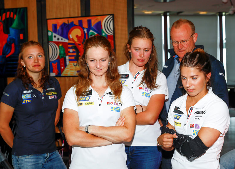 © Reuters. Swedish biathlete athletes Linn Persson, Emma Brorsson, Elvira Oberg, Anna Magnusson and Swedish Biathlon Association Secretary General Ingemar Arwidson react after Stockholm and Are, lost the bid to host the 2026 Winter Olympic Games, in Ostersund