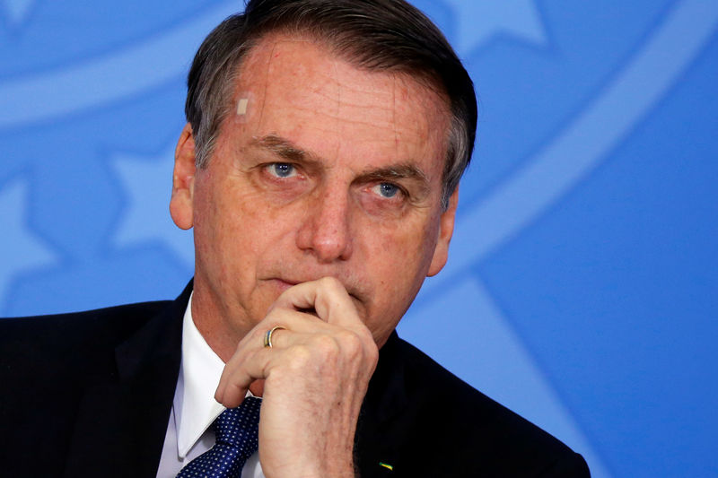 © Reuters. Brazil's President Jair Bolsonaro attends a ceremony of the Brazilian National Development Bank (BNDES) Line of Credit for Philanthropic Organizations at the Planalto Palace in Brasilia