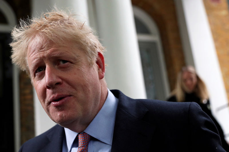 © Reuters. FILE PHOTO: PM hopeful Boris Johnson leaves his home in London