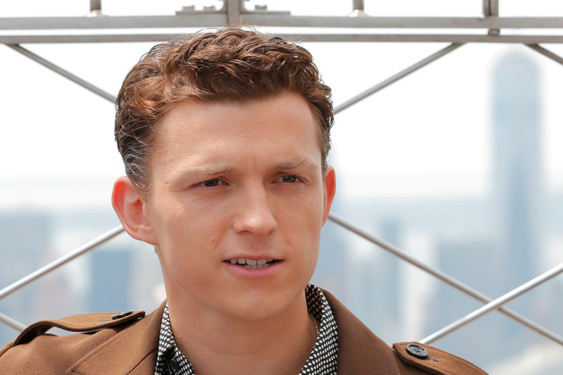 © Reuters. FILE PHOTO: Actor Tom Holland poses for a photograph on top of the Empire State Building to promote the film, Spider-Man: Far From Home in New York