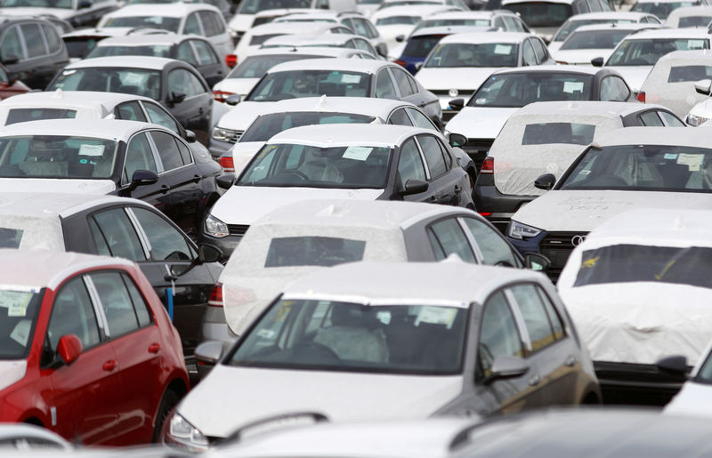 © Reuters. FILE PHOTO: Imported cars are parked in a storage area at Sheerness port, Sheerness