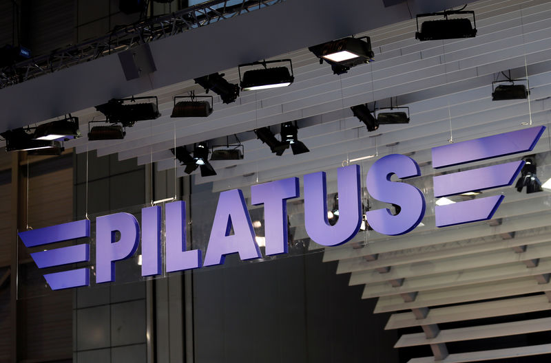 © Reuters. FILE PHOTO: A Pilatus logo is pictured on the company booth during the European Business Aviation Convention & Exhibition (EBACE) at Cointrin airport in Geneva