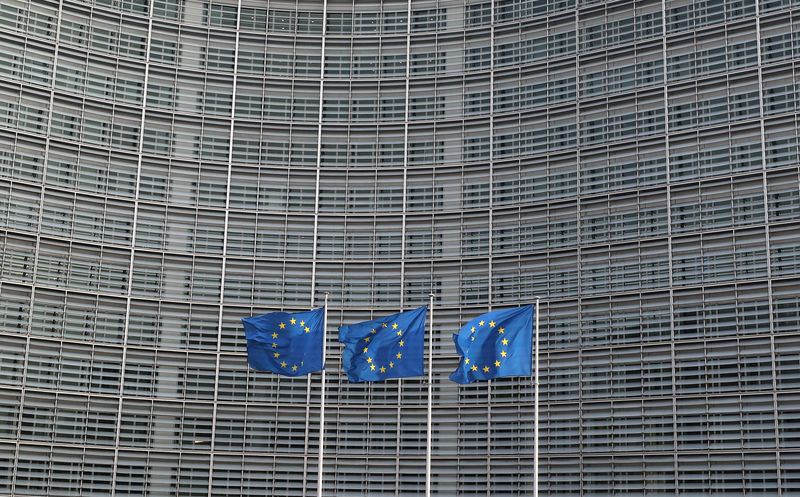 © Reuters. FILE PHOTO: European Union flags fly outside the European Commission headquarters in Brussels