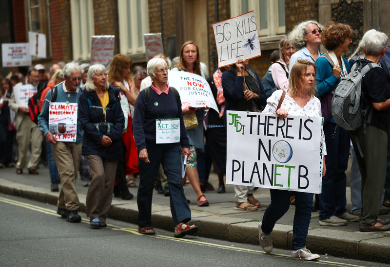 Protesters gather at Britain's parliament to urge climate action