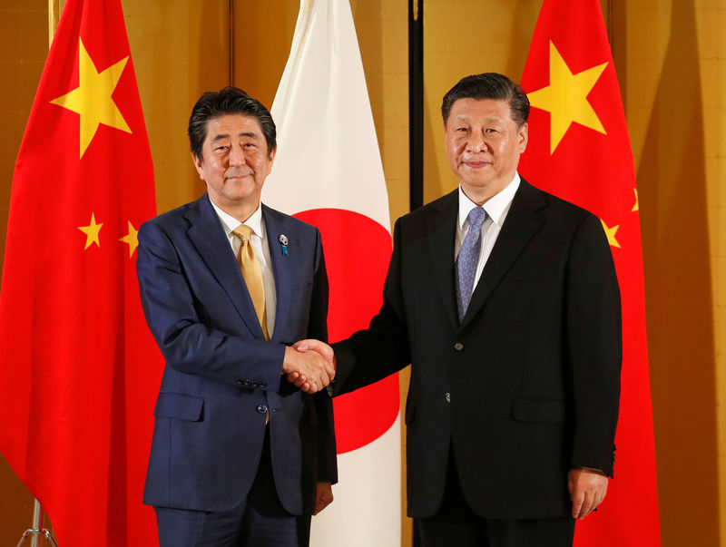 مسؤول ياباني: شي وآبي يتفقان على الحاجة إلى &quot;تجارة حرة وعادلة&quot;