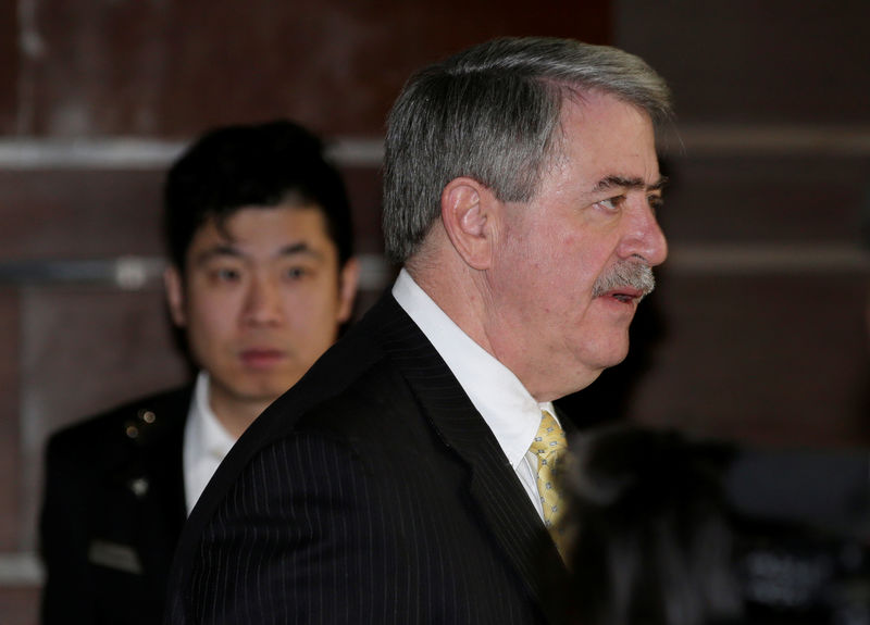 © Reuters. FILE PHOTO :U.S. trade delegation member Ted McKinney leaves a hotel for talks with Chinese officials in Beijing