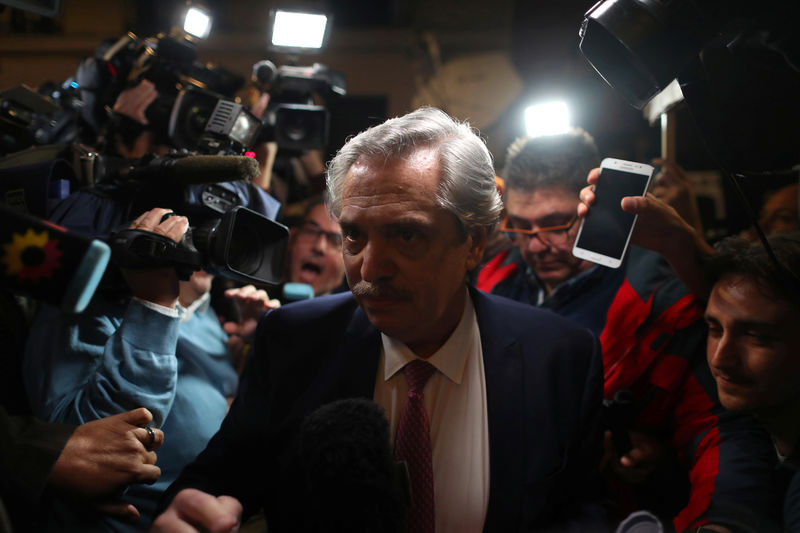 © Reuters. FILE PHOTO: Presidential candidate Alberto Fernandez arrives for a meeting in Buenos Aires