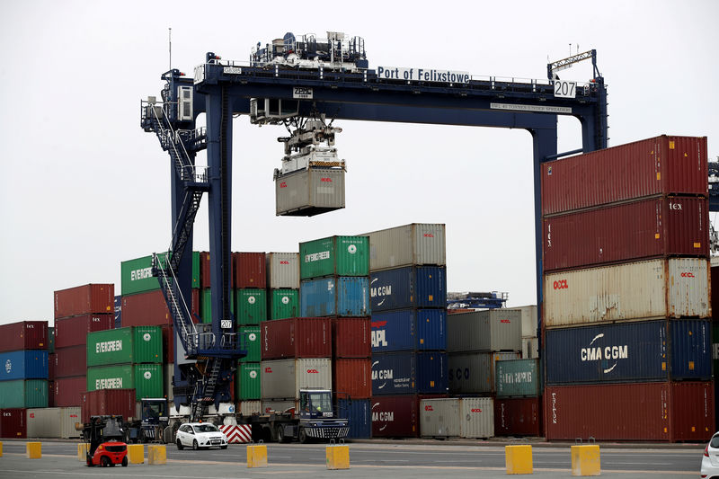 © Reuters. FILE PHOTO: A shipping container is lifted at Felixstowe Port