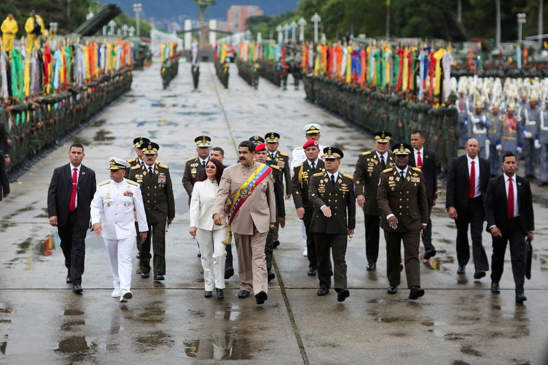 © Reuters. FILE PHOTO: Venezuela's President Nicolas Maduro arrives for a military parade to celebrate the 196th anniversary of the Battle of Carabobo, in Caracas