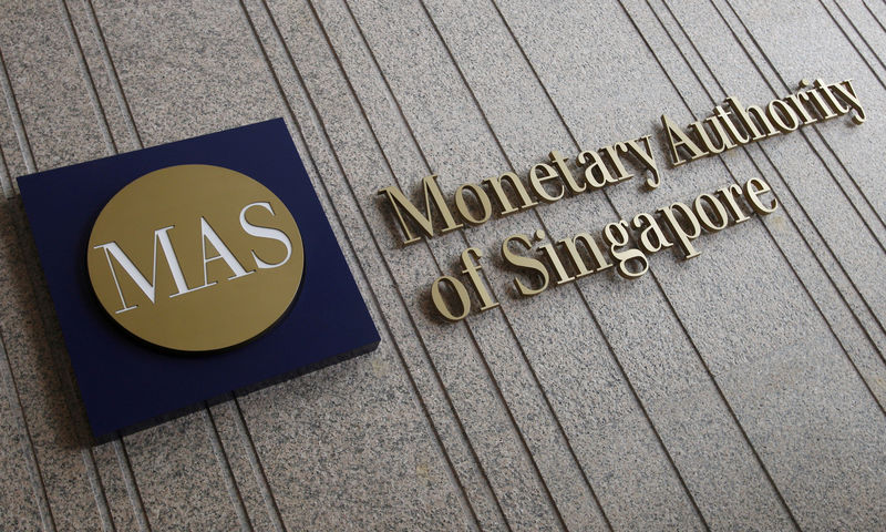 © Reuters. FILE PHOTO: File photo of the logo of the Monetary Authority of Singapore at its building in Singapore