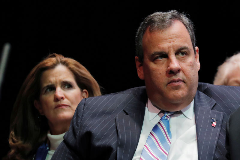 © Reuters. FILE PHOTO: Former New Jersey Governor Chris Christie and his wife, Mary Pat, listen to newly sworn in New Jersey Governor, Phil Murphy, speaking after taking the oath of office in Trenton, New Jersey