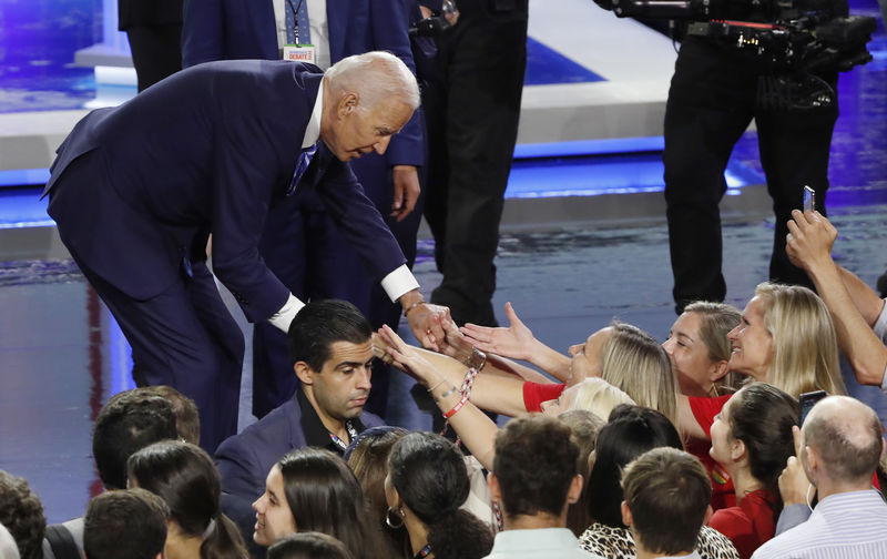 © Reuters. Former Vice President Joe Biden greets supporters at the conclusion of the second night of the first U.S. 2020 presidential election Democratic candidates debate in Miami, Florida, U.S.