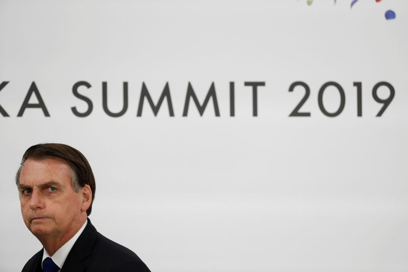 © Reuters. Imagen de archivo del presidente de Brasil, Jair Bolsonaro, durante una conferencia de prensa en la cumbre del G-20 en Osaka, Japón
