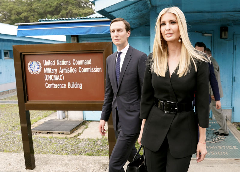 © Reuters. White House senior advisors Ivanka Trump and Jared Kushner walk at the demilitarized zone separating the two Koreas