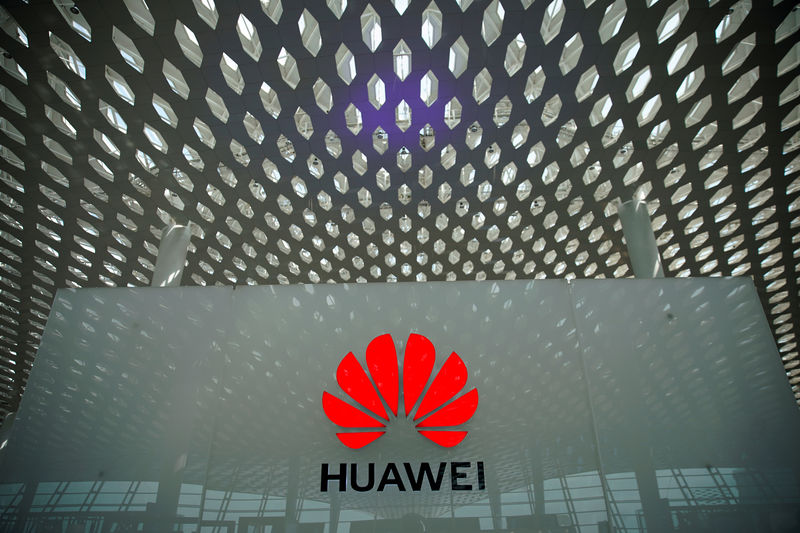 © Reuters. FILE PHOTO: A Huawei company logo at the Shenzhen International Airport