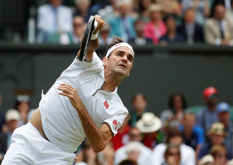 Federer survives first-set wobble to down Wimbledon debutant