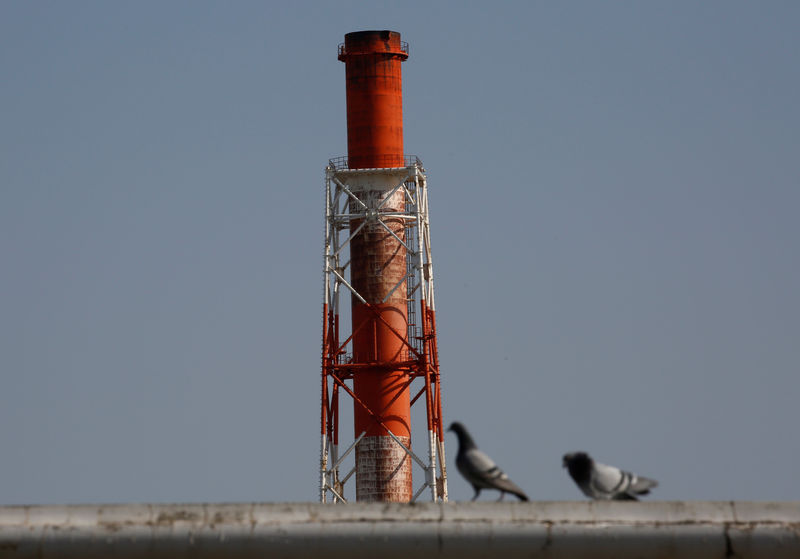 Oil edges up after steep fall; OPEC cuts, stocks draw support