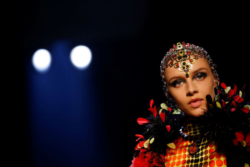 © Reuters. A model presents a creation by designer Jean Paul Gaultier as part of his Haute Couture Fall/Winter 2019/20 collection show in Paris