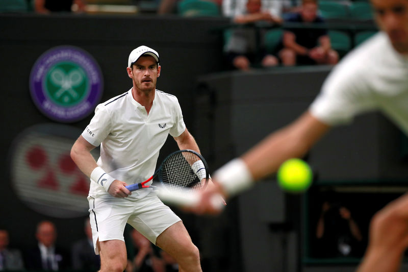 Murray makes winning doubles return as Brits march on