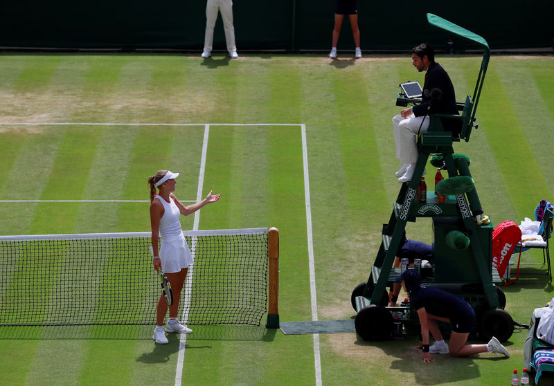 Wozniacki's Wimbledon ends in grumbles