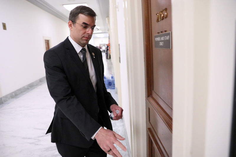 © Reuters. FILE PHOTO: U.S. Representative Amash arrives for a House Oversight Committee Hearing on Capitol Hill in Washington