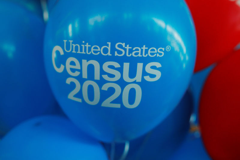 © Reuters. FILE PHOTO: Balloons decorate an event for community activists and local government leaders to mark the one-year-out launch of the 2020 Census efforts in Boston