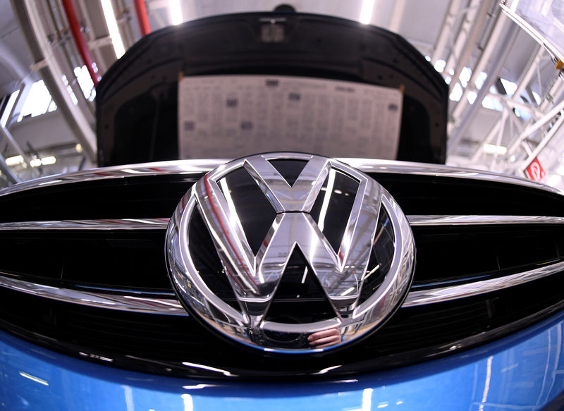 © Reuters. A Volkswagen logo is pictured in a production line at the Volkswagen plant in Wolfsburg