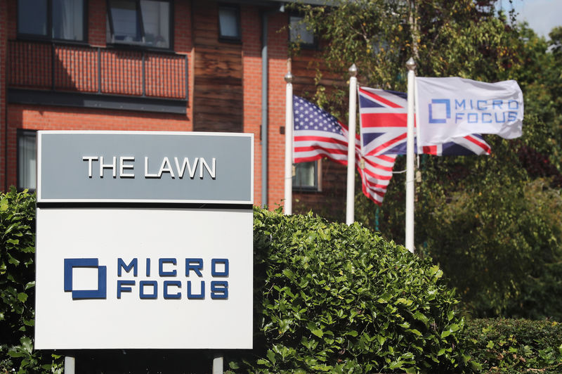 © Reuters. Signs and flags are seen outside offices of Micro Focus in Newbury