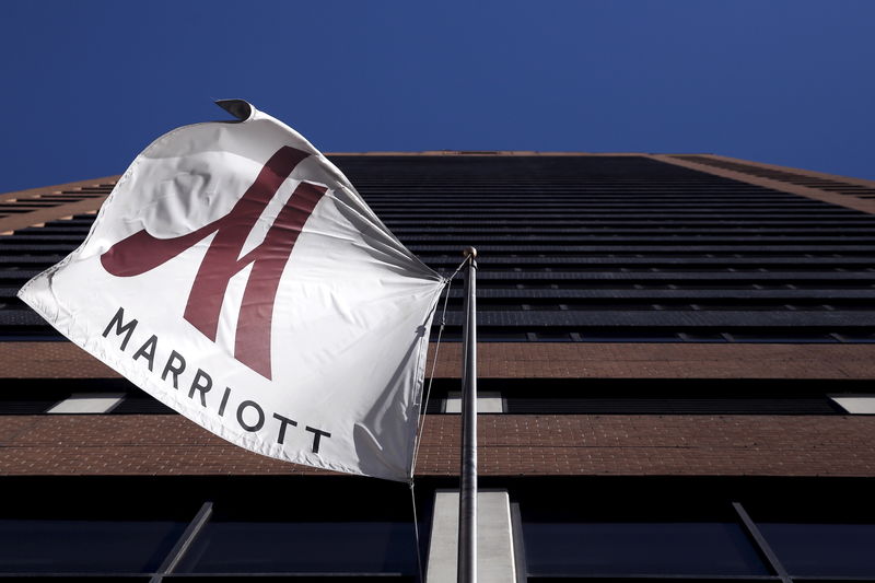 © Reuters. FILE PHOTO: A Marriott flag hangs at the entrance of the New York Marriott Downtown hotel in Manhattan, New York