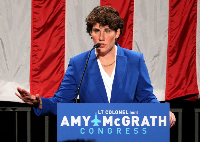 © Reuters. FILE PHOTO: Democratic congressional candidate Amy McGrath reacts after appearing at her election night party in Richmond