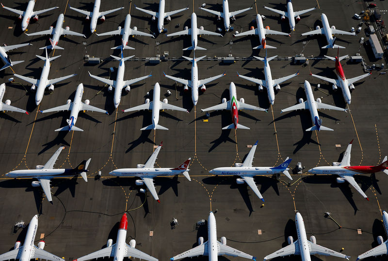 © Reuters. Grounded Boeing 737 MAX aircraft are seen parked at Boeing Field in Seattle