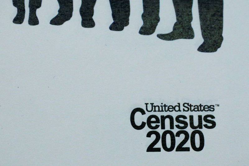 © Reuters. FILE PHOTO: FILE PHOTO: An informational pamphlet is displayed at an event for community activists and local government leaders to mark the one-year-out launch of the 2020 Census efforts in Boston