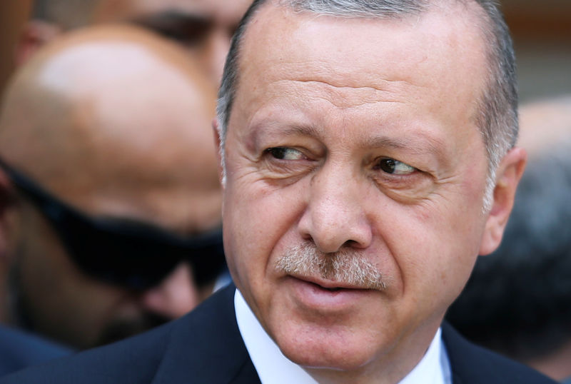 © Reuters. Turkey's President Erdogan pays his respects to the Srebrenica genocide victims