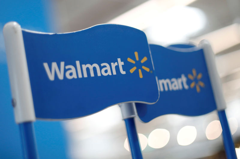 © Reuters. FILE PHOTO: Walmart signs are displayed inside a Walmart store in Mexico City