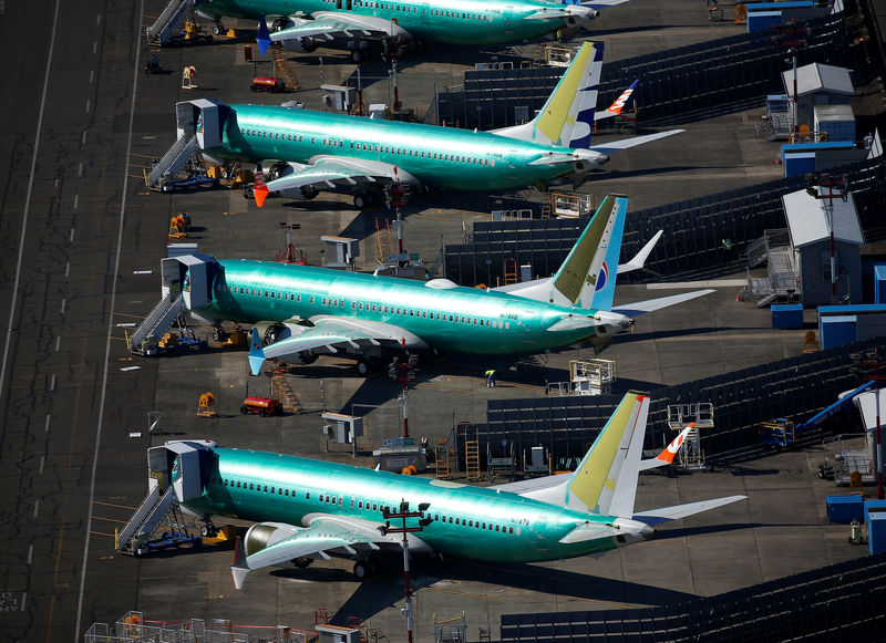 © Reuters. Unpainted Boeing 737 MAX aircraft are seen parked at Renton Municipal Airport in Renton