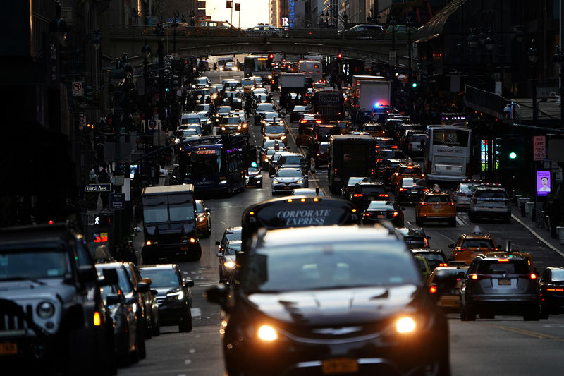 © Reuters. Traffic is pictured at twilight along 42nd St. in Manhattan