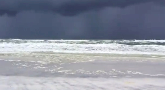 © Reuters. Dark clouds are seen as Storm Barry approaches near Santa Rosa Beach in Seaside