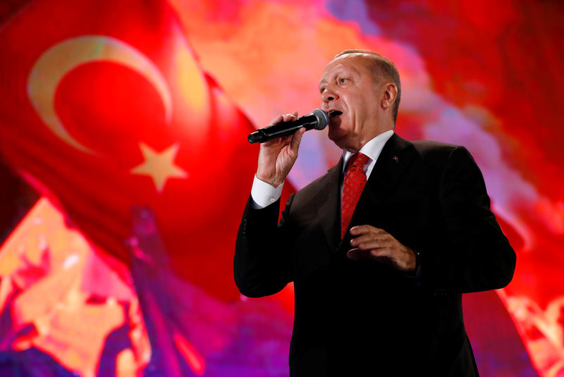 © Reuters. Turkish President Erdogan addresses his supporters during a ceremony marking the third anniversary of the attempted coup at Ataturk Airport in Istanbul