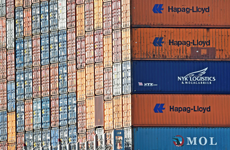 © Reuters. FILE PHOTO: File photo of Hapag Lloyd containers stacked at the shipping terminal Altenwerder in the harbour of Hamburg