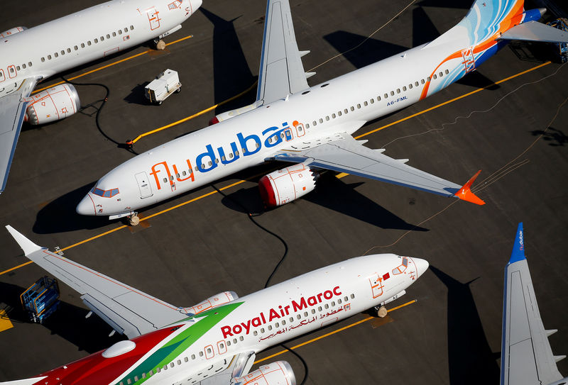 © Reuters. FILE PHOTO: Grounded flydubai and Royal Air Maroc Boeing 737 MAX aircraft are seen parked at Boeing Field in Seattle