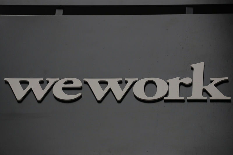 © Reuters. FILE PHOTO: The WeWork logo is displayed outside of a co-working space in New York