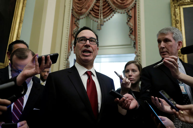 © Reuters. FILE PHOTO: U.S. Treasury Secretary Steve Mnuchin speaks to Capitol Hill reporters in Washington