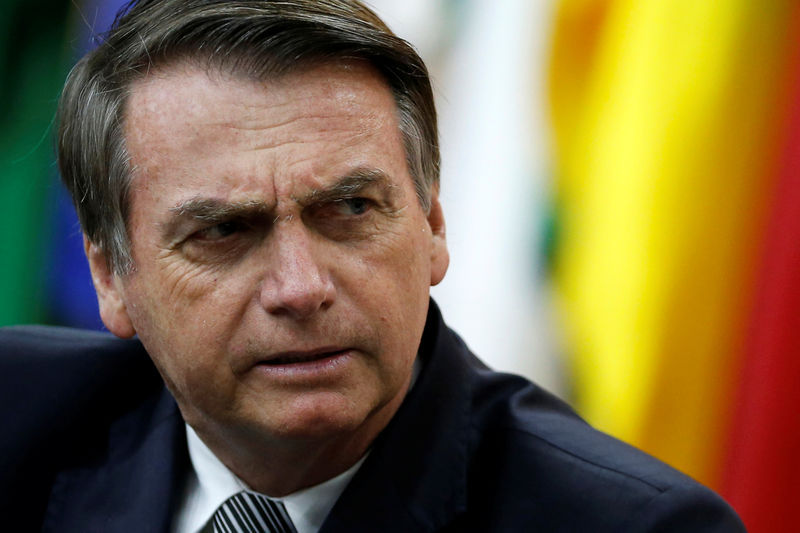 © Reuters. Brazil's President Jair Bolsonaro looks on during a National Soccer Day Cerenomy in Brasilia